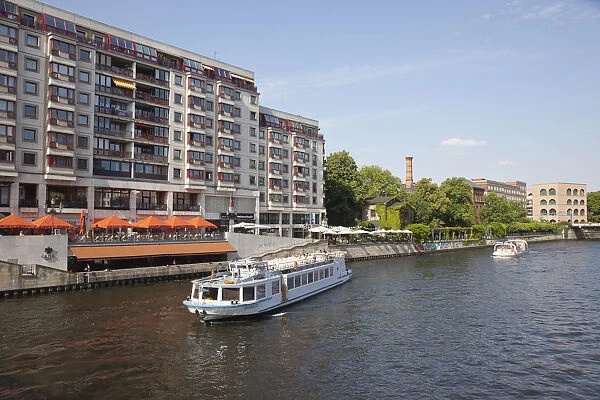 Germany, Berlin, Mitte, Tourist Cruise boats on the River Spree near Friedrichstrasse