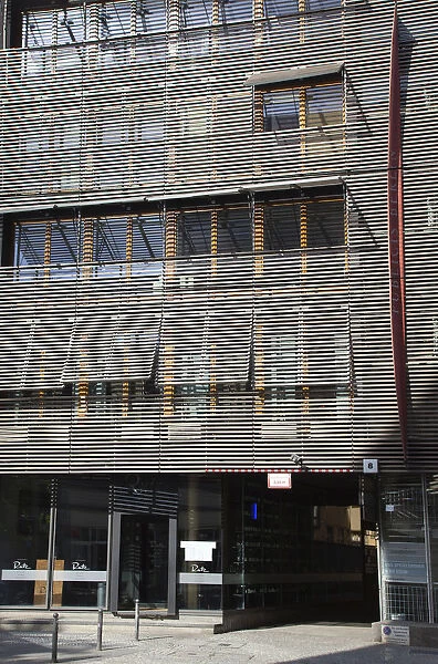 Germany, Berlin, Mitte, Wood clad modern building on Friedrichstrasse