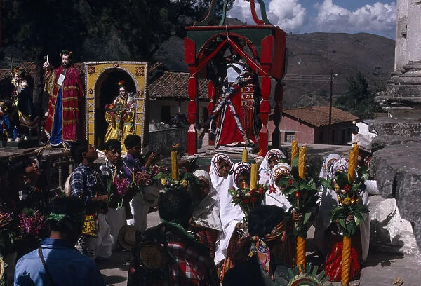 GUATEMALA, El Quiche, San Andres de Sajcabaja Quiche Indians knelling in prayer to the
