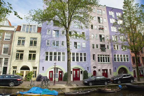 Holland, North, Amsterdam, Colourful modern canalside buildings