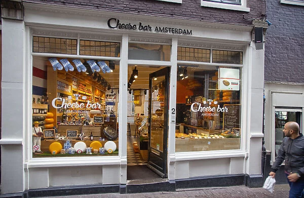 Holland, North, Amsterdam, Exterior of cheese bar with window display of various cheeses