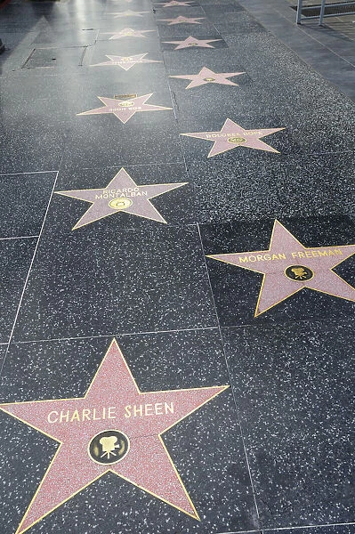 Hollywood Walk of Fame along Hollywood Boulevard showing stars of Charlie Sheen Morgan Freeman & Ricardo Montalban