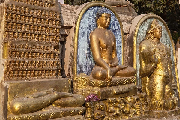 India, Bihar, Bodhgaya, Images of the buddha at the Mahabodhi Temple in Bodhgaya
