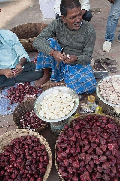 India, Bihar, Gaya, Vendor selling water chestnuts