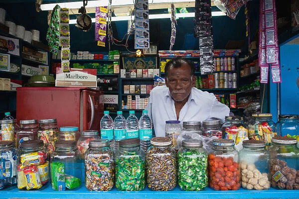 India, Pondicherry, Shop owner in Pondicherry