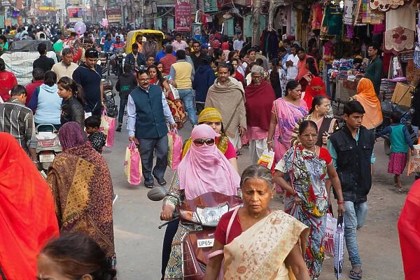 India, Uttar Pradesh, Varanasi, Pedestrians and road users on Dasashwamedh Ghat Road