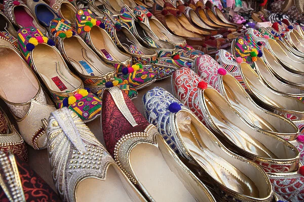 India, West Bengal, Kolkata, Display of traditional ladies footwear mojaris and jootis in a shop in New Market