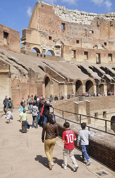 Italy, Lazio, Rome, Colosseum, interior view of the Colosseum with people walking around