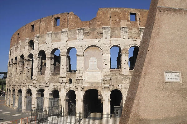 Italy, Lazio, Rome, Colosseum, view of Colosseum with brick wall