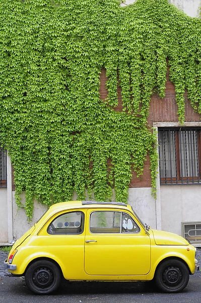 Italy, Lazio, Rome, yellow Fiat 500 Bambini