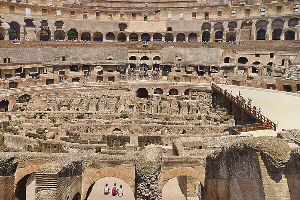 Italy, Rome, The Colosseum amphitheatre built by Emperor Vespasian in AD 80 with the interior thronged with tourists