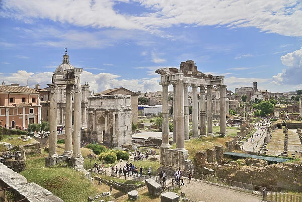 Italy, Rome, View of the Roman Forum from Capitoline Hill with ruins of the Arch of Septimus Severus and the Temple of Saturn prominent
