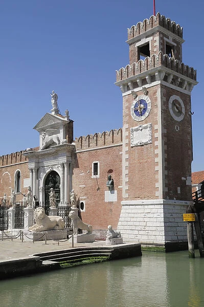 Italy, Veneto, Venice, Porta del Arsenale with clock tower & lion statues