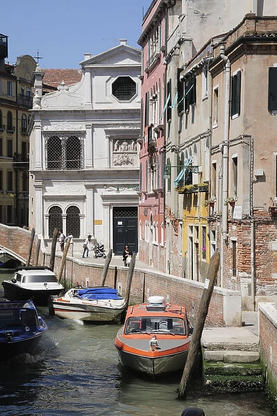 Italy, Veneto, Venice, Scuola San Giorgio degli Schiavoni beside canal