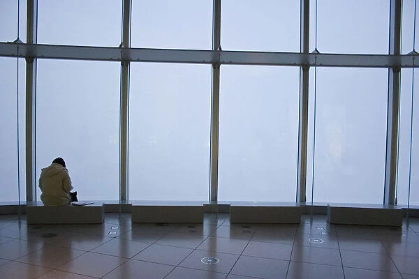 JAPAN 6. Japan /  Tokyo. woman is resting alone at one of the benches of Tokyos art museum