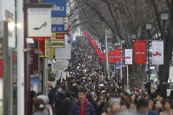 Japan Tokyo Harajuku shoppers crowd on Omotesando-dori street
