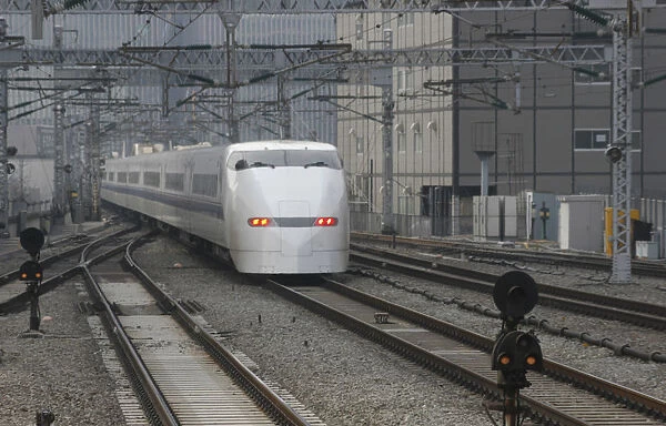 Japan Tokyo a hikari shinkansen bullet train arrives at Station