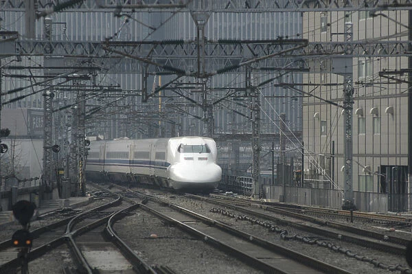 Japan Tokyo a nozomi shinkansen bullet train arrives at station
