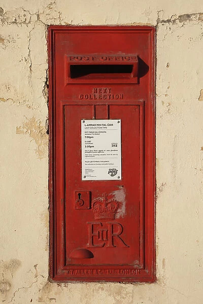 Malta, Qawra, British ER red post box in wall