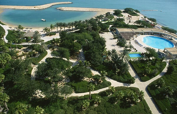 Qatar, Doha, Aerial view over the Sheraton Hotel swimming pool and beach