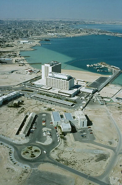 Qatar, Doha, The harbour area under development in the 1970s with the Gulf Hotel in the