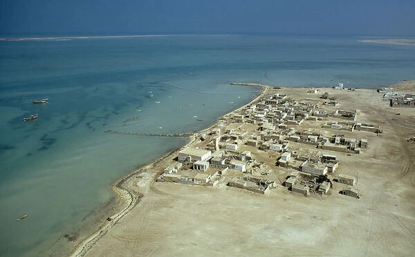 Qatar, Ruwais, Coastal town with the Gulf sea beyond