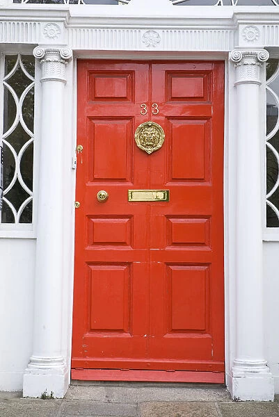 Red door in Georgian doorway
