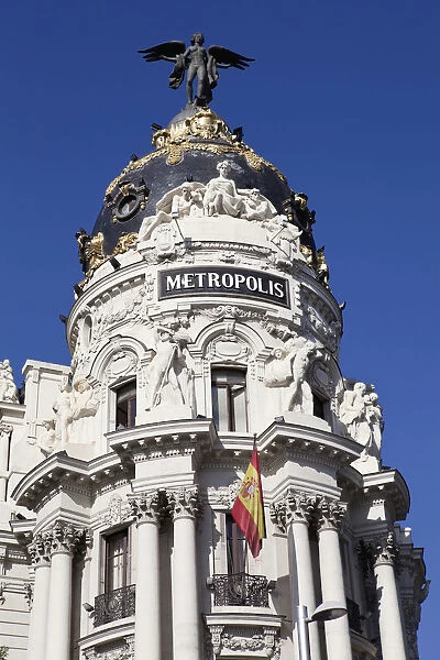 Spain, Madrid, Metropolis Building on Alcala Grand Via junction