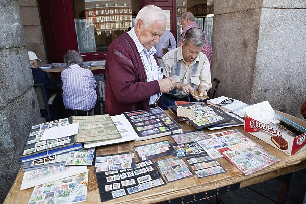Spain, Madrid, Stamp collectors in the Plaza Mayor