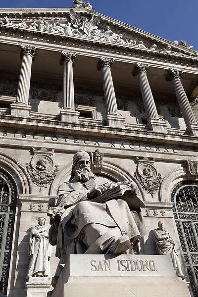 Spain, Madrid, Statue of San Isidoro on the steps of the National Library