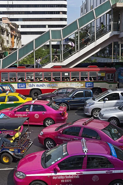 Thailand, , Bangkok. Thailand, Bangkok Gridlocked street including 3 pink taxis