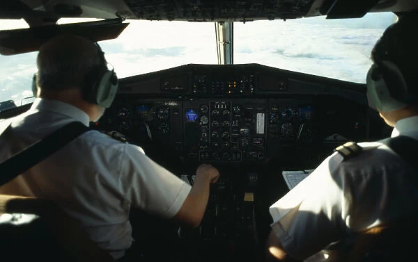Transport, Air, Cockpit, Pilots on flightdeck during flight