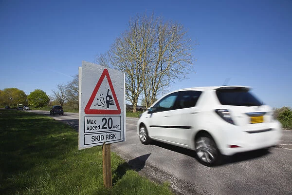Transport, Road, Cars, resurfaced road with sign warning of reduced speed limit