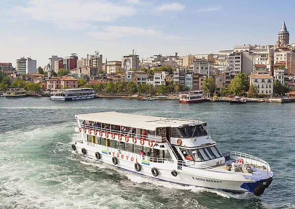 Turkey, Istanbul, Passenger ferry in the Golden Horn, and Galata Tower