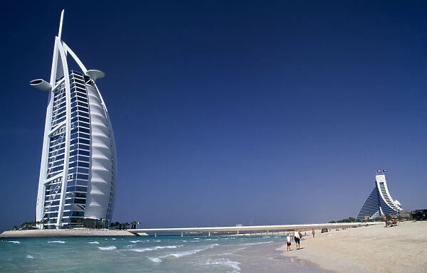UAE, Dubai Burj-al-Arab Hotel with the Jumeirah Beach Hotel behind