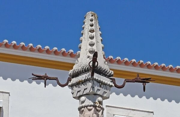 Pillary in small town square, used in early times to hang people up for punishment, Elvas, Portalegre District