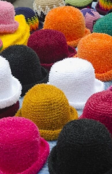 Colorful hats for sale souvenirs in small village of Otavalo Ecuador South America