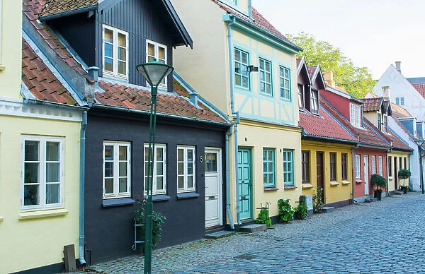 Odense Denmark, beautiful old row homes cobblestone streets in Hans Christian Andersen