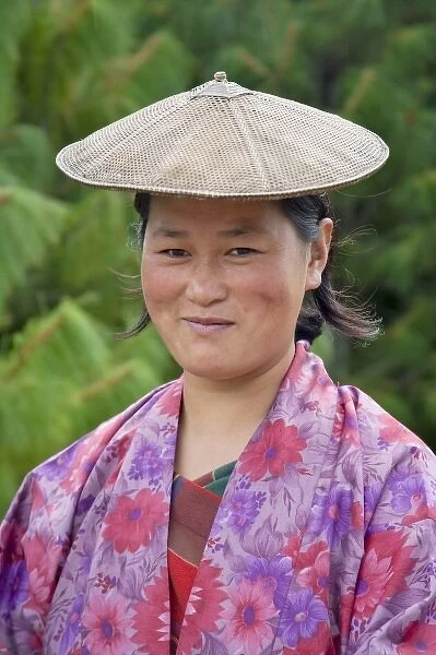 Portrait of a farmer wearing bamboo hat, Bumthang, Bhutan. (MR)