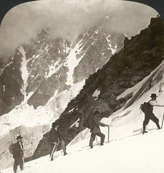ALPINE MOUNTAINEERING, 1908. Climbers ascending Mont Blanc in the Savoy Alps, with