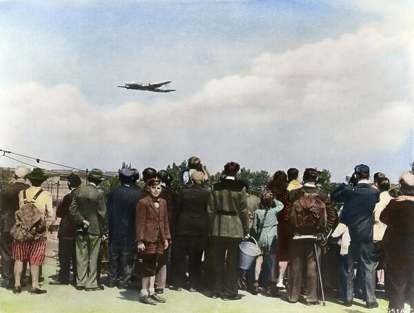 BERLIN AIRLIFT, 1948. Berliners watching the arrival and departure of Allied airlift
