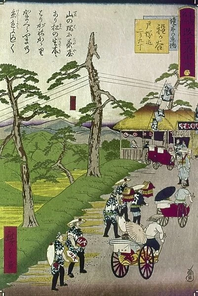 JAPAN: TOKAIDO ROAD, c1870. Telegraph wires are strung on living trees in this view of the Tokaido Road between Tokyo and Kyoto. Woodblock print, c1871, by Ando Hiroshige