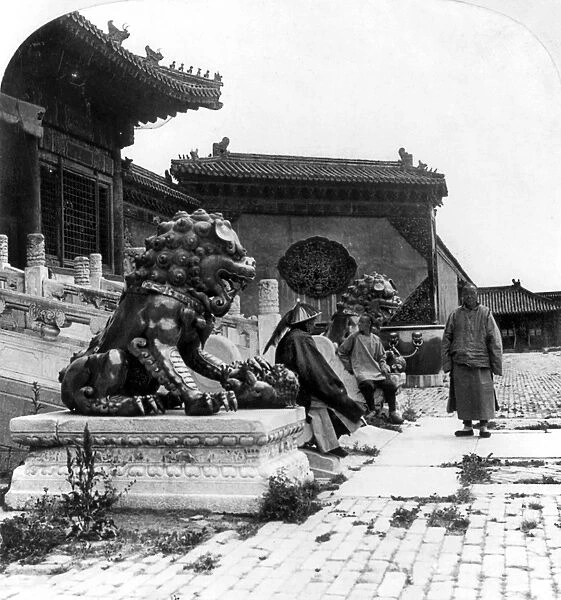 PEKING: FORBIDDEN CITY. Porcelain statues of dog-like gods in the Court of the
