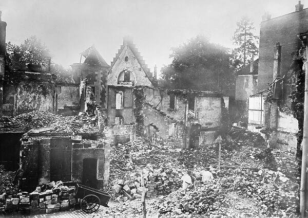 WWI: RUINS, 1914. Ruined buildings on Rue Bellan in Senlis, France. Photograph, 1914