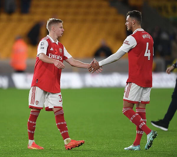 Arsenal's Zinchenko and White Celebrate Victory Over Wolverhampton Wanderers in 2022-23 Premier League