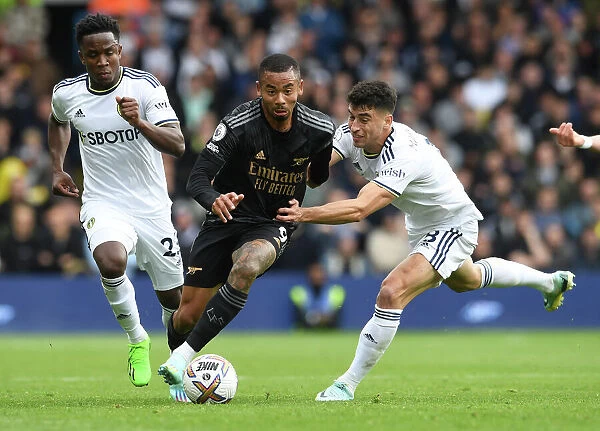 Gabriel Jesus Faces Off Against Leeds Duo in Intense Arsenal-Leeds Clash (2022-23 Premier League)