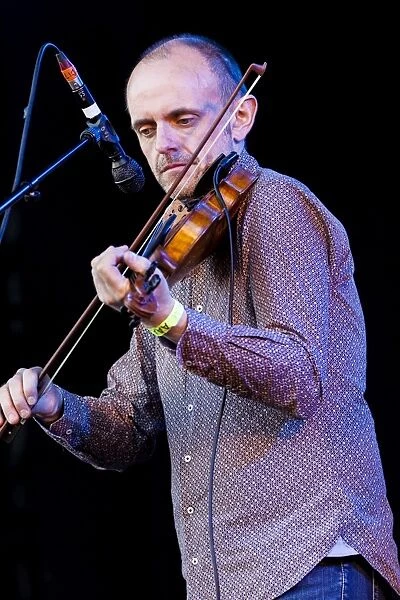 Duncan Chisholm of the Julie Fowlis Band playing at Oban Live in Scotland