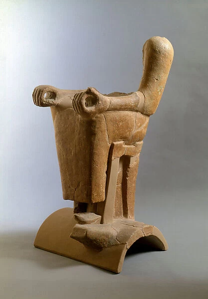 Etruscan civilization: terracotta acrotere representing a seated character from the 2nd