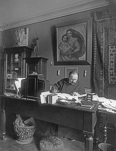 French composer Jules Massenet sitting at his desk (b  /  w photo)