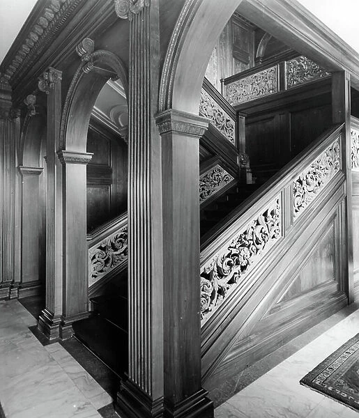 The hall and staircase, Ardenrun, Surrey, from England's Lost Houses by Giles Worsley (1961-2006) published 2002 (b / w photo)